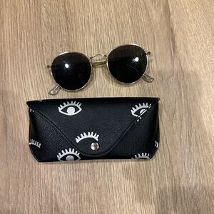 Round Sojos gold frame sunglasses with case